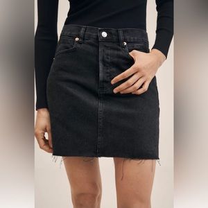 Denim miniskirt with frayed hem